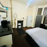 16 Double Bed With Kitchen Inside The Room